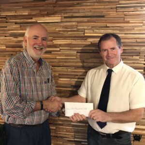 Presenting a cheque to Paul Bulbeck
